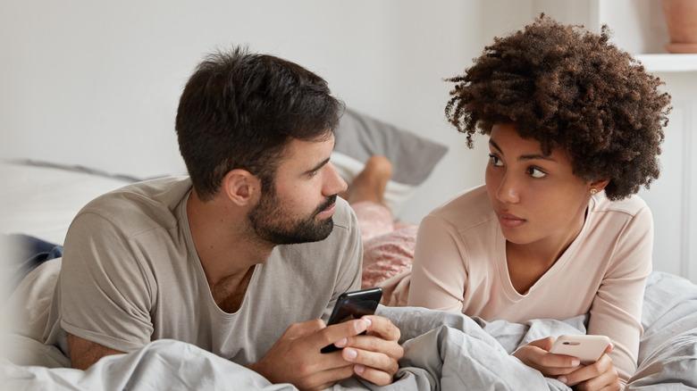 couple talking in bed