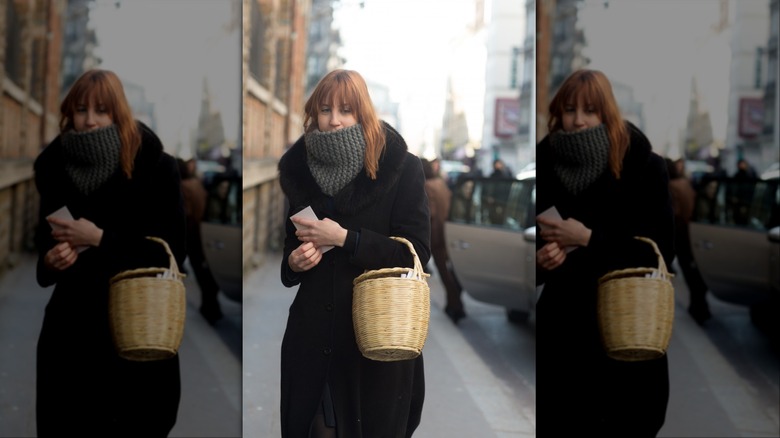 woman holding basket bag