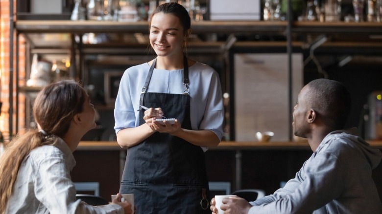 Couple talking to the server