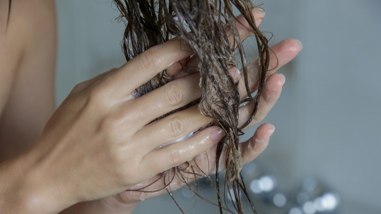 A woman washing her hair