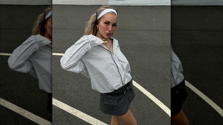 woman wearing miniskirt and button down