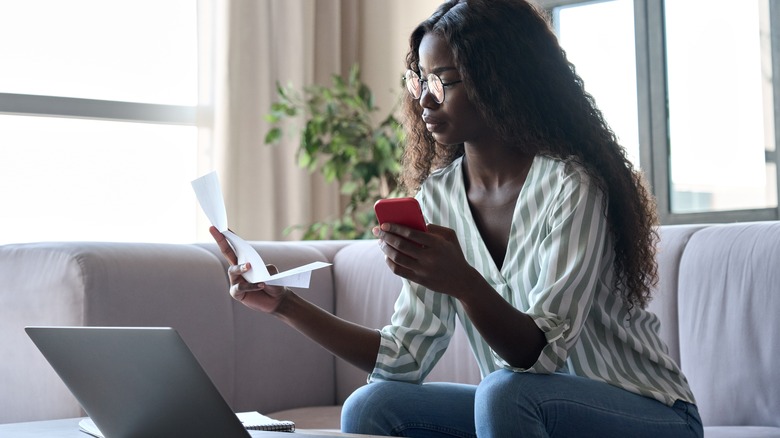 Woman discusses bill on phone