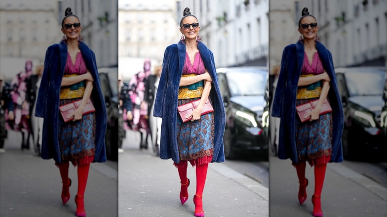 Woman wearing multicolored dress 