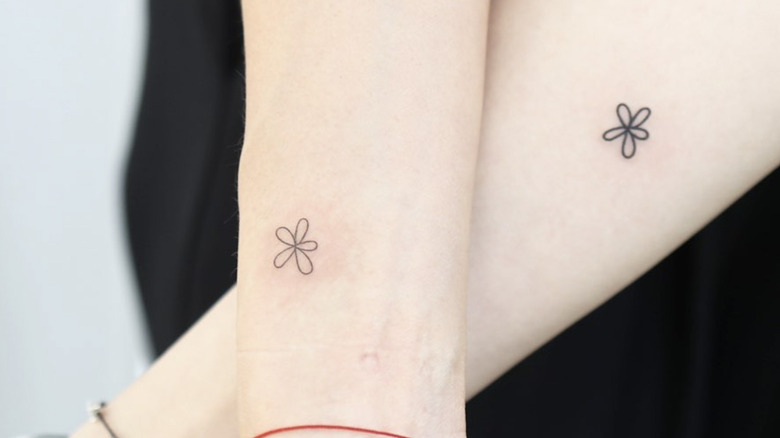 matching flower tattoos