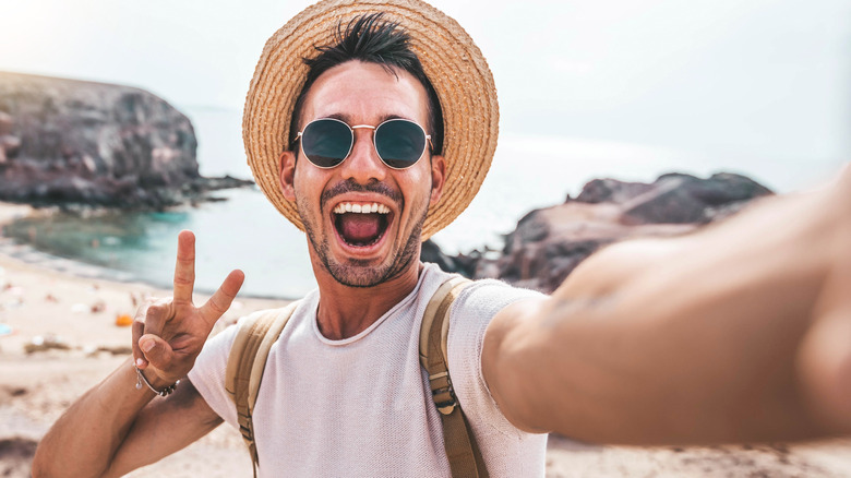 man taking selfie