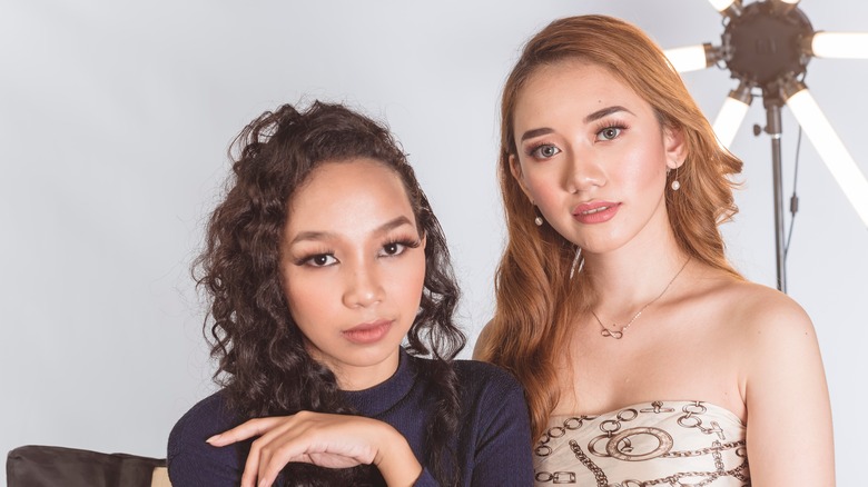 two women with brown and orange hair