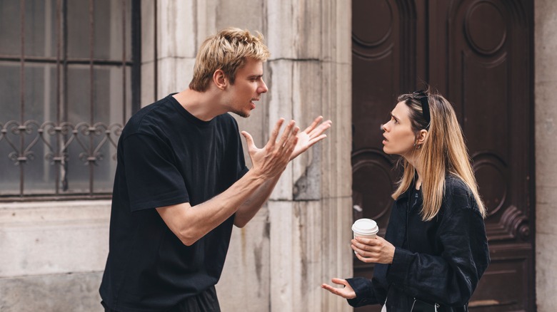 couple arguing in public