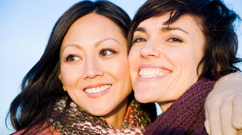 Two women smiling