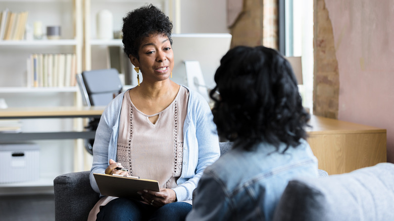 Woman meeting with therapist