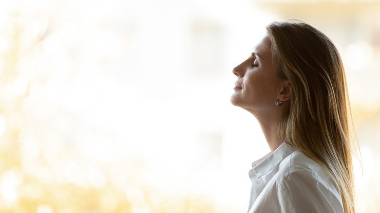 woman relaxing and at peace