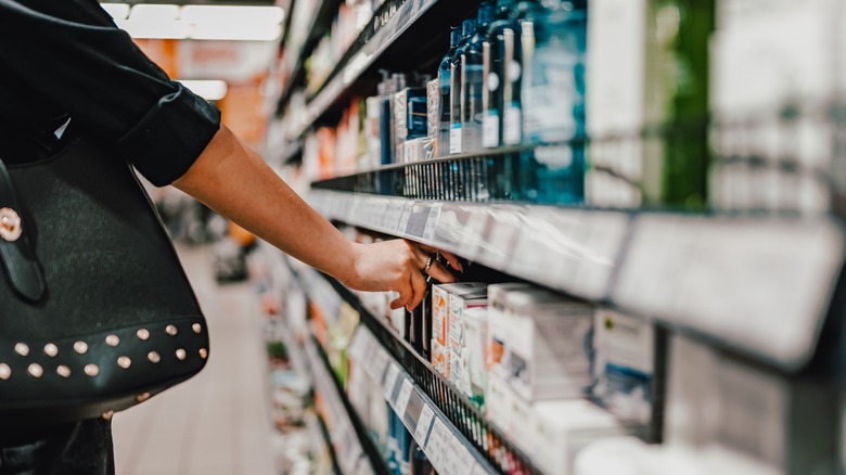 Person choosing hair products