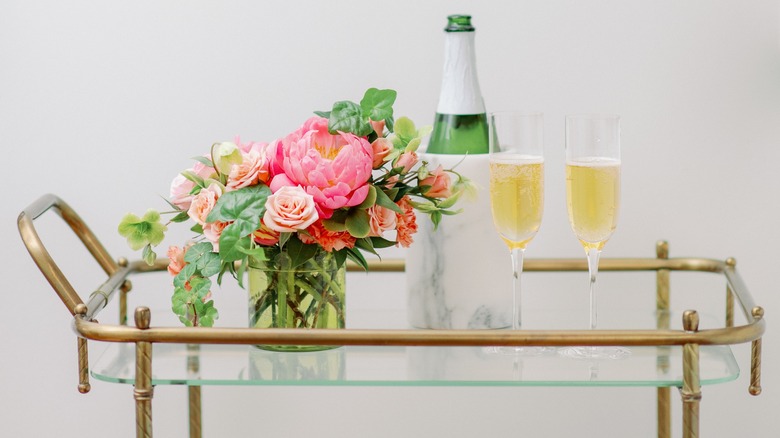 Bar cart with bouquet of flowers