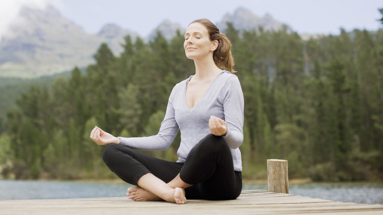 Woman doing yoga in comfortable clothes