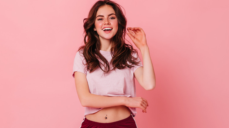 Woman with makeup in athletic clothes