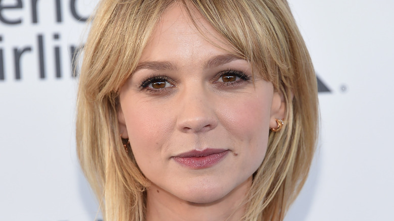 Carey Mulligan on red carpet with curtain bangs