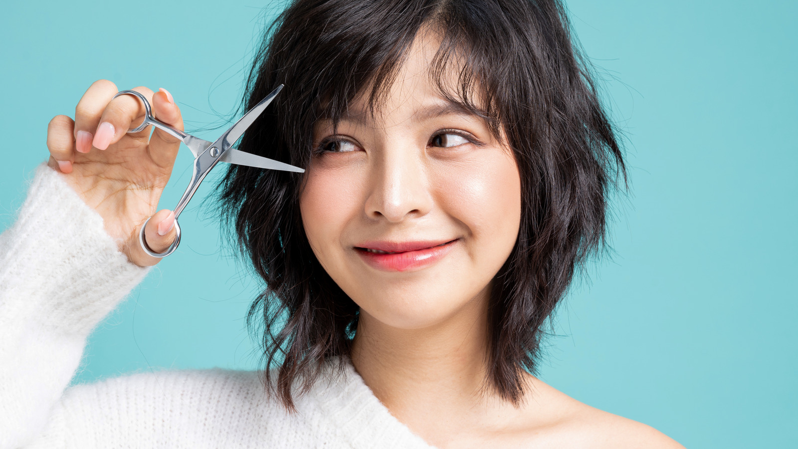 how-to-cut-and-style-your-own-curtain-bangs-at-home