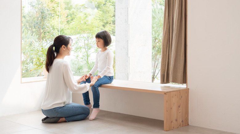 mom and daughter talking