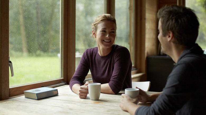 woman having tea with boyfriend