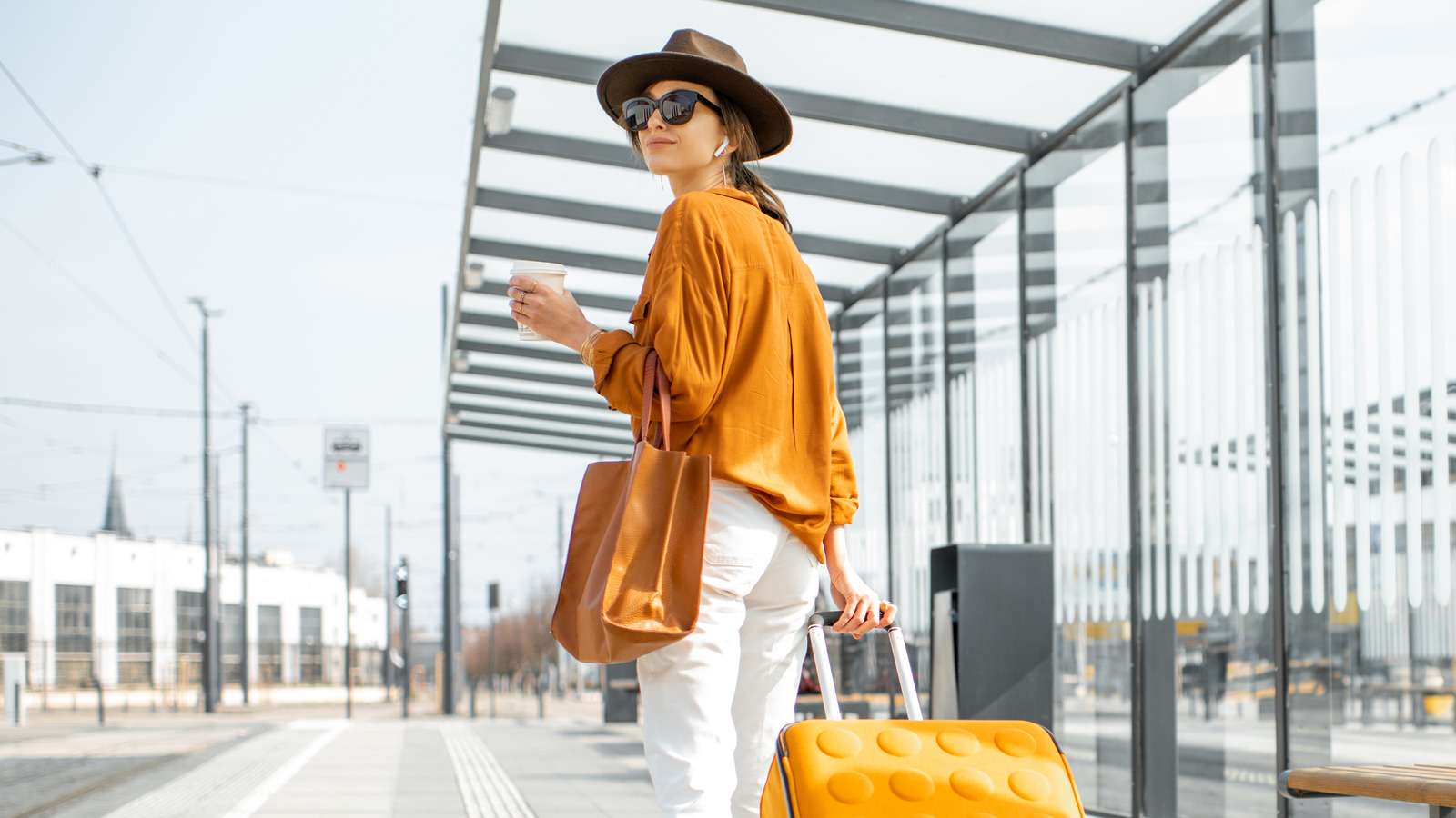 How To Dress For Your Flight When You re Traveling To A Totally 