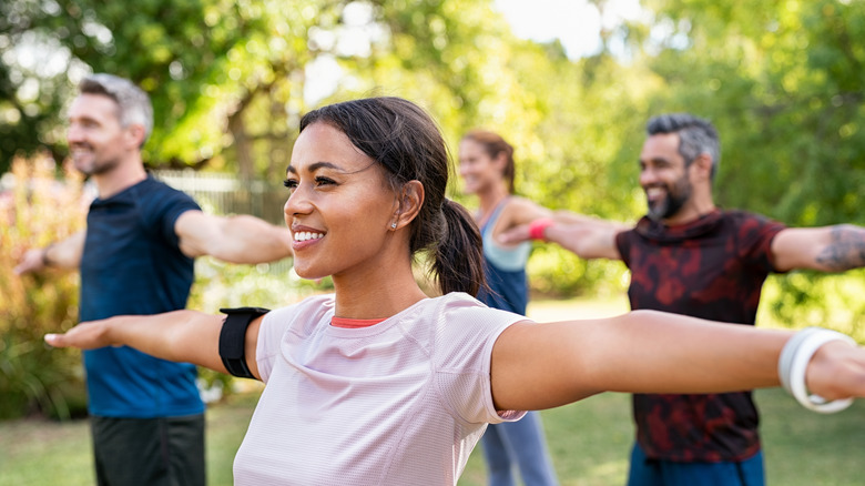 men and women working out