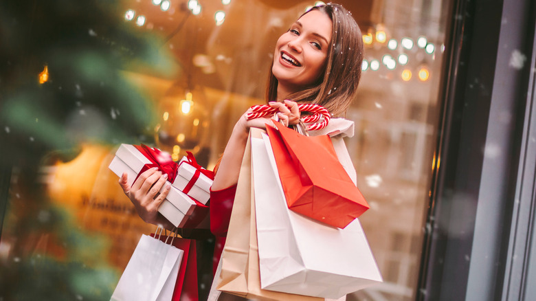 Happy woman holiday shopping