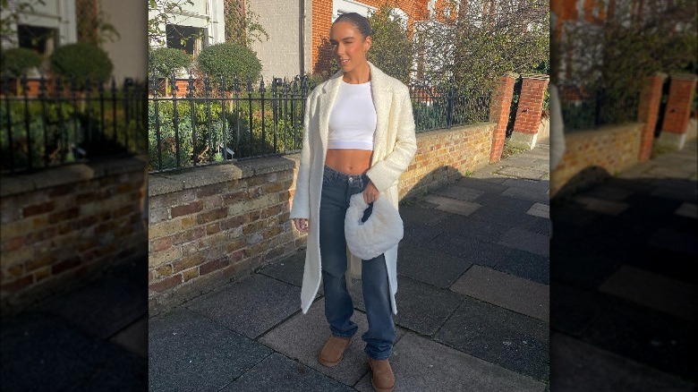 Woman wearing white tank, cardigan