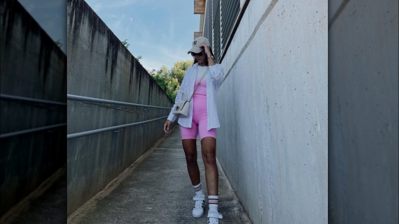 Woman wearing pink bike shorts