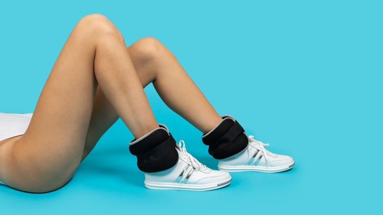 Woman's legs with ankle weights