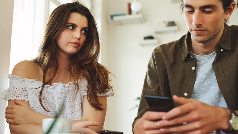 woman looking frustrated at man