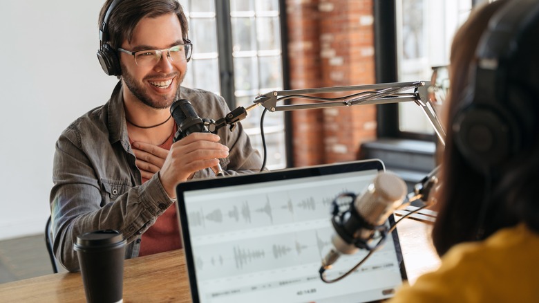 Podcast guest speaking into microphone