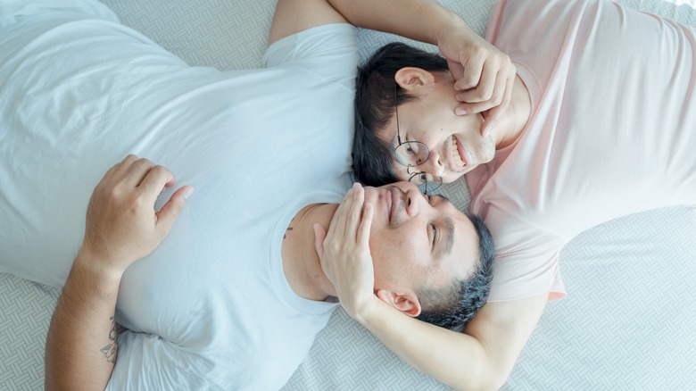 couple talking in bed