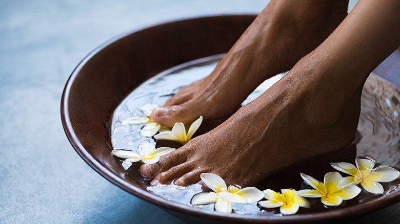 woman soaking feet