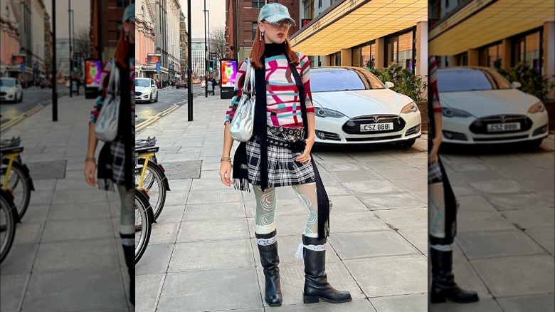 Woman wearing cool outfit with two belts 