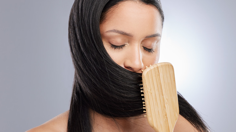 Brush Vs. Comb: Which Is Actually Right For Your Hair?