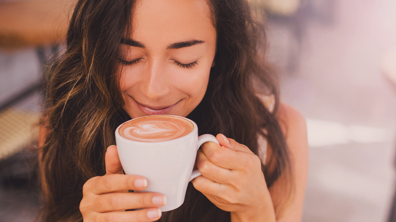 woman with cup of coffee