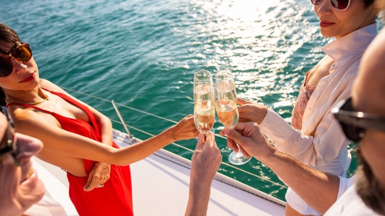 Group celebrating on a yacht