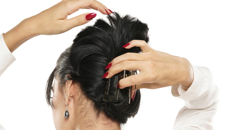 Woman using hair clip like a pro 