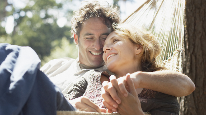 happy couple in hammock