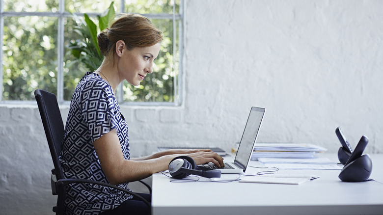 worming working at desk