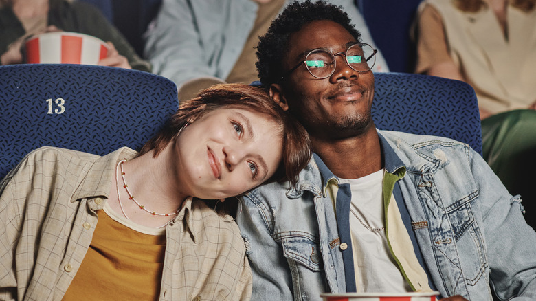 man and woman at theater