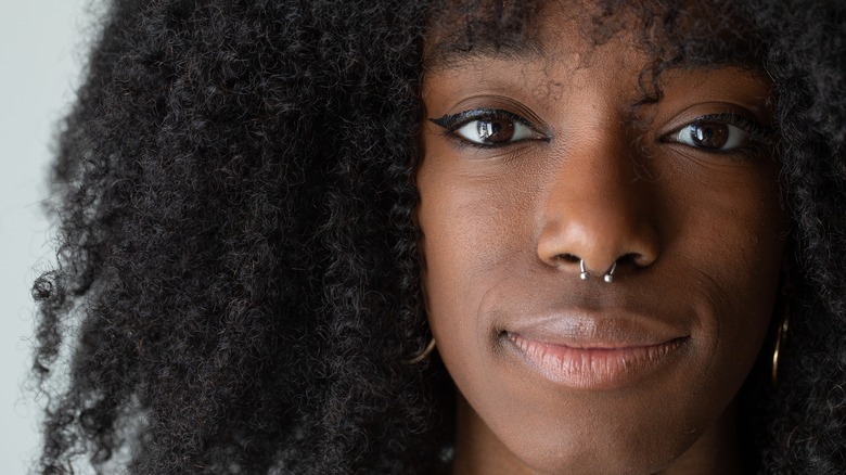 A woman with a septum piercing