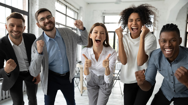 group of office workers smiling