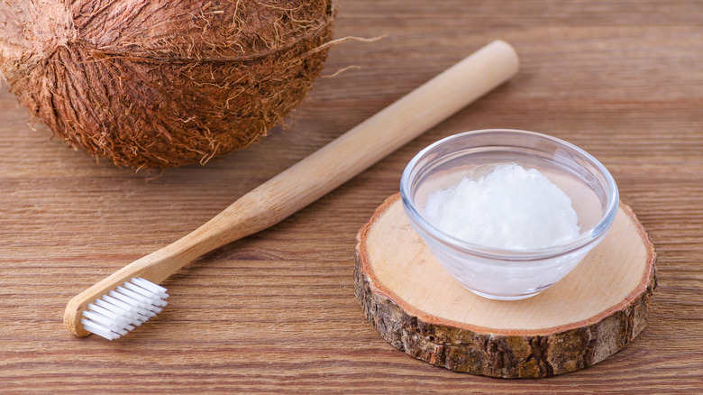 Coconut oil and a toothbrush