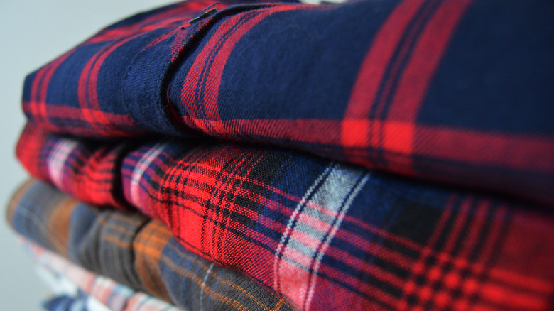 stack of flannel shirts