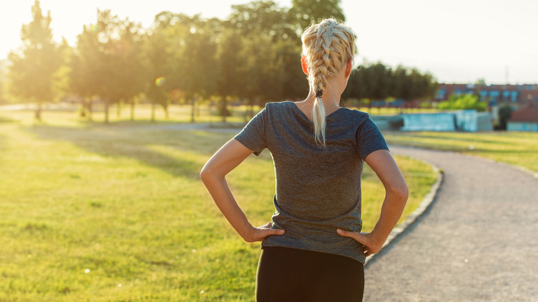 woman wearing French braid on track