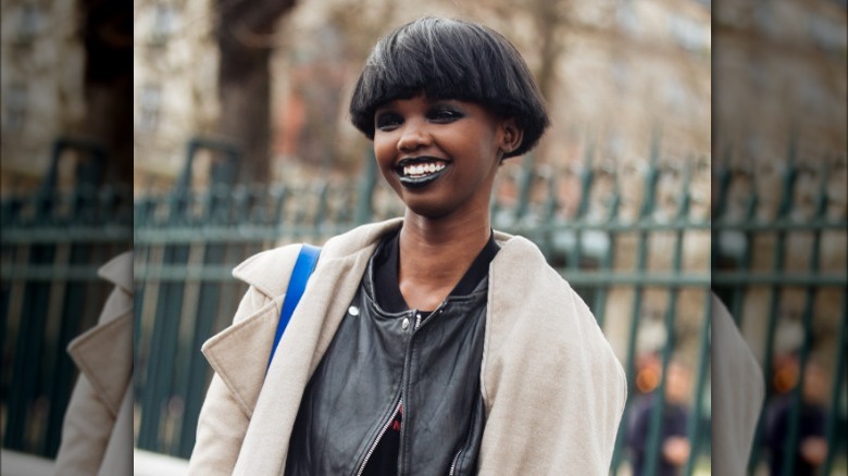 Model Akiima with sharp bowl cut