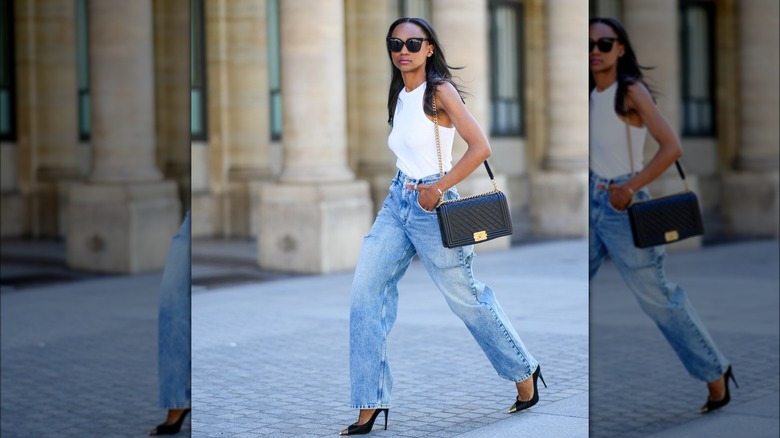 Woman wearing boyfriend jeans and high heels