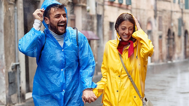 couple wearing raincoats