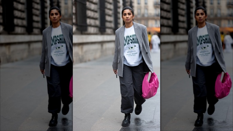 woman wearing sweatshirt under blazer