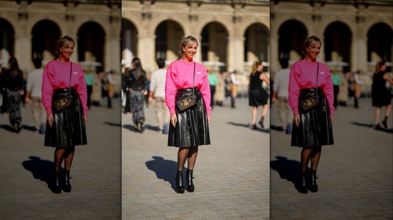 woman wearing pink sweatshirt